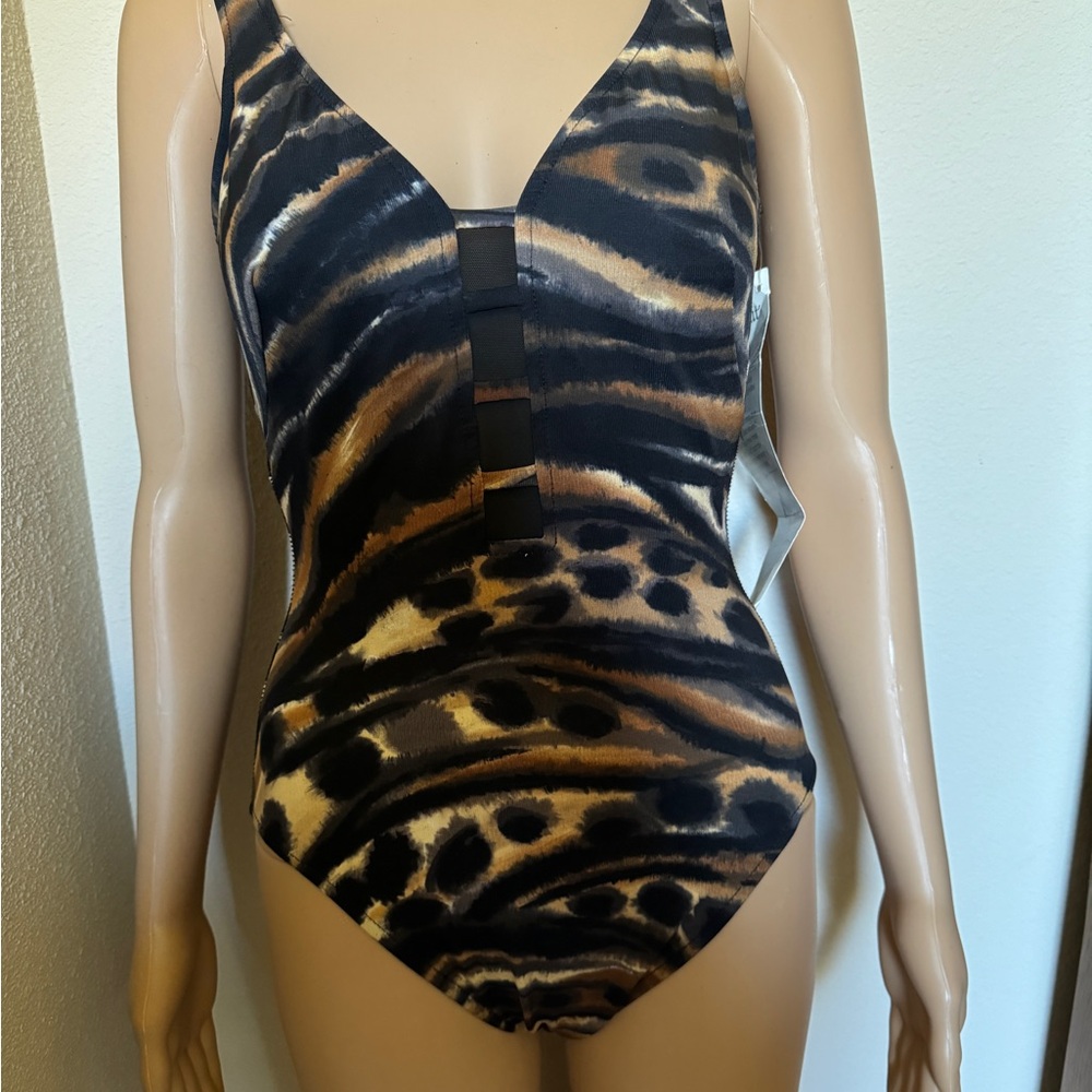 Women’s one-piece bathing suit by MIRACLESUIT Swim Shaper.